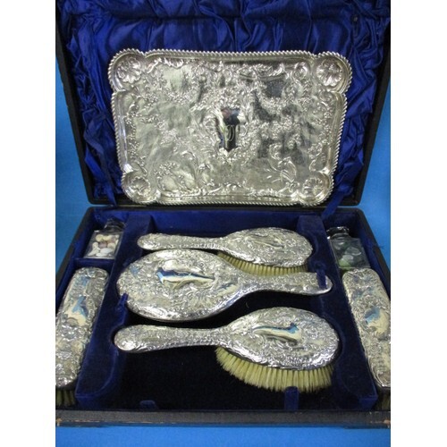 A late Victorian silver dressing table set, incudes the orig...