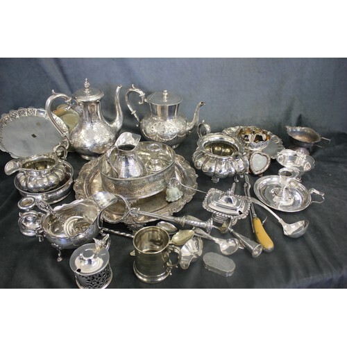 A late Victorian silver-plated three piece set, a sugar and ...