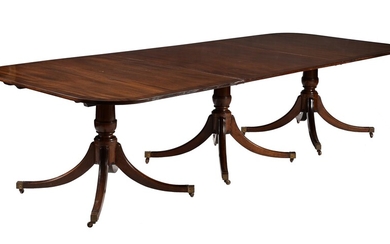 A mahogany three-pillar dinning table in George III style