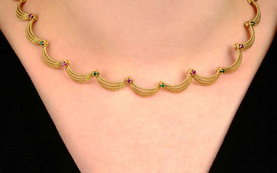 A mid 20th century 18ct gold, ruby and emerald, rope-twist swag necklace.