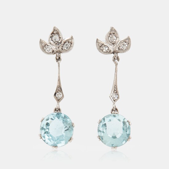 A pair of 18K white gold earrings set with faceted aquamarines and eight-cut diamonds