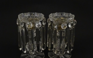 A pair of 20thC cut glass table lustres / candle stands. App...