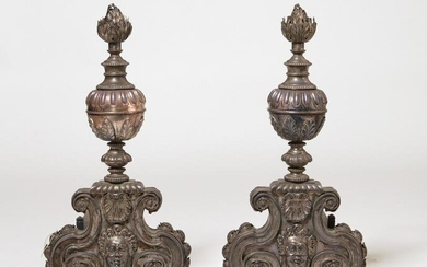 A pair of Baroque style white metal andirons