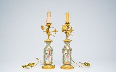 A pair of Chinese Canton famille rose vases with palace scenes and floral design mounted as lamps