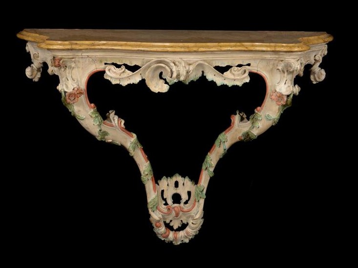 A pair of Italian carved and polychrome painted wood console tables, circa 1770