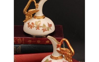 A pair of Royal Worcester ewers, of compressed form, decorat...