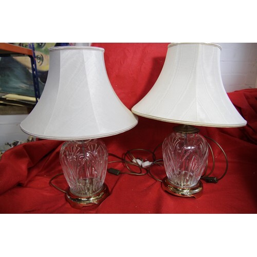 A pair of Waterford Crystal table lamps with brass bases and...