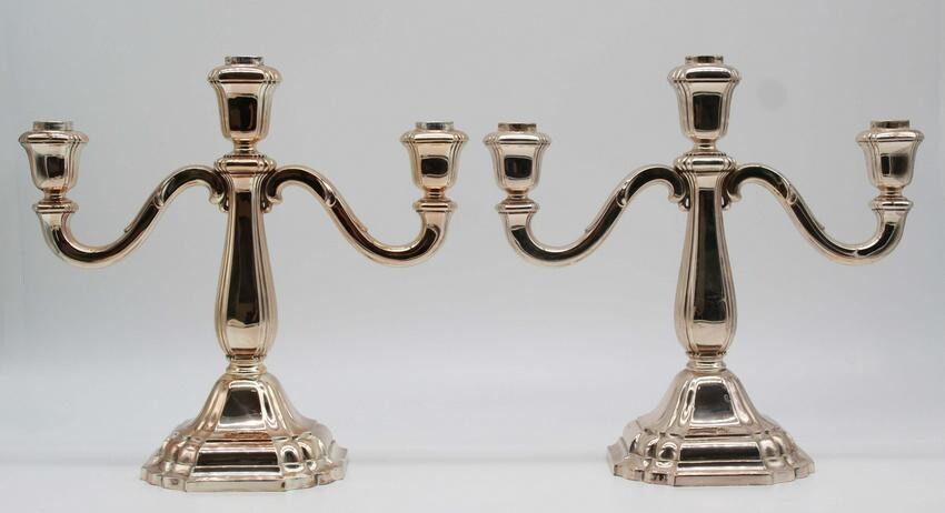 A pair of candlesticks. Silver 835.