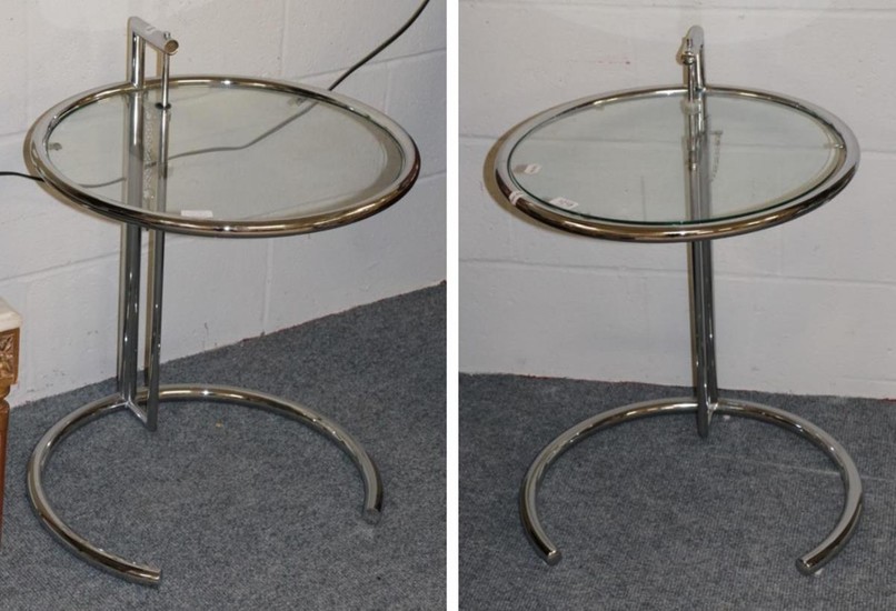 A pair of chromed tubular glass top circular lamp tables,...