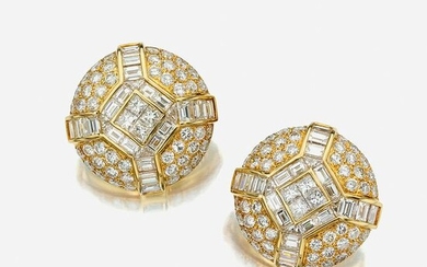 A pair of diamond and eighteen karat gold earclips