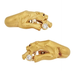 A pair of diamond earrings, by Carrera...