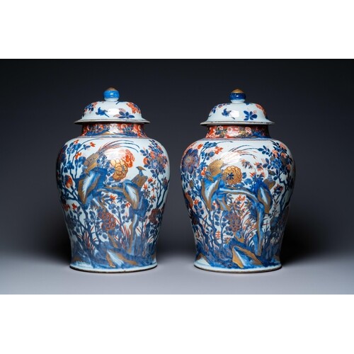 A pair of large Chinese gilded Imari-style vases and covers,...