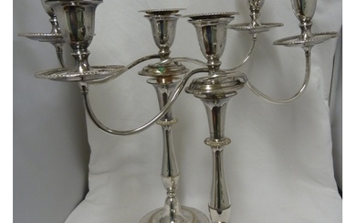 A pair of silver plated candelabra, either three light with ...