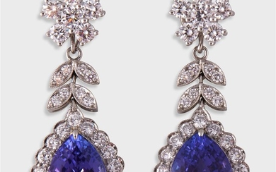A pair of tanzanite, diamond, and platinum drop earrings...