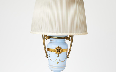A porcelain table lamp with bronze details, Empire style, 20th century.