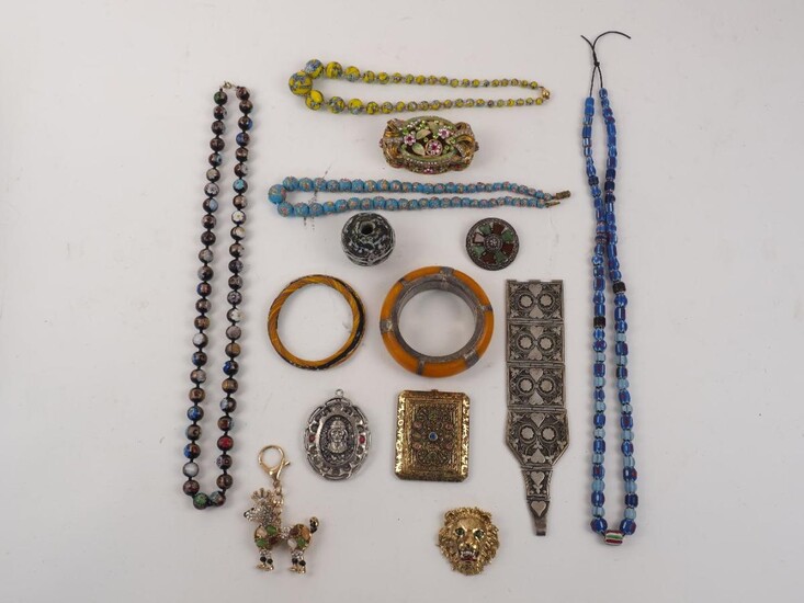 A quantity of costume jewellery, 20th century/modern, to include: a gilt metal compact, hardstone beads, cufflinks, necklaces, bracelets, broaches and others (a lot) Please note: the image illustrates only examples and not the full quantity of this...