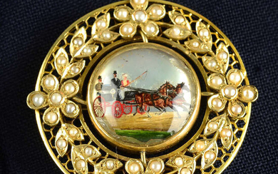 A reverse carved and painted horse and carriage brooch, with split pearl floral surround.
