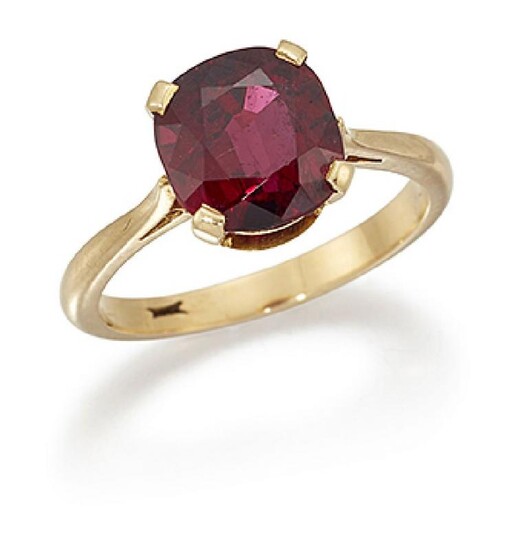 A ruby single stone ring, the cushion...