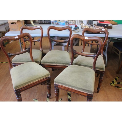 A set of five Victorian rosewood kidney back dining chairs o...