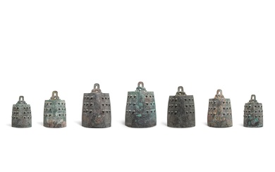 A set of seven archaic bronze ritual bells, bo, Eastern...