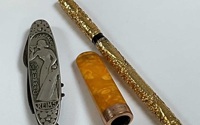 A vintage pocket knife and corkscrew marked 'Champagne Jules Mumm...
