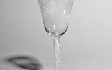 A wine glass c.1760, with a generous rounded...