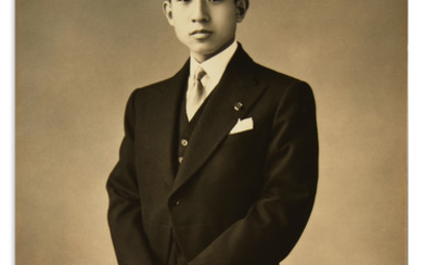 THE YOUNG PRINCE AKIHITO; EMPEROR OF JAPAN. Photograph Signed, in Japanese, 3/4-length portrait,...