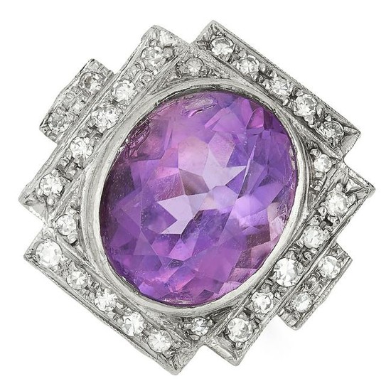 AMETHYST AND DIAMOND RING set with an oval cut amethyst