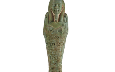 AN EGYPTIAN TURQUOISE FAIENCE SHABTI FOR TJANHEBU, LATE PERIOD, CIRCA 664-332 B.C.