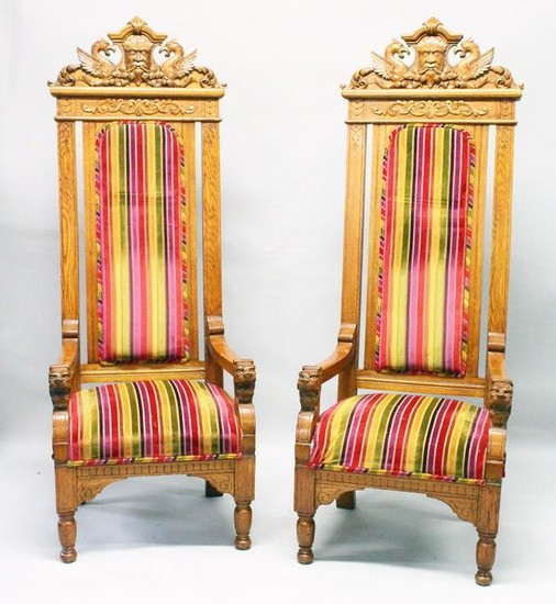 AN IMPRESSIVE PAIR OF OAK "THRONE" STYLE ARMCHAIRS