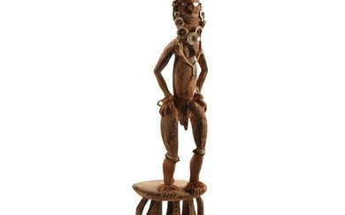 African Wood Carved and Pink Painted Standing Figure.