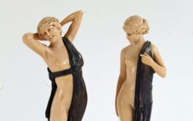 After Ferdinand Preiss (1882-1943), a pair of Art Deco style simulated ivory semi nude classical