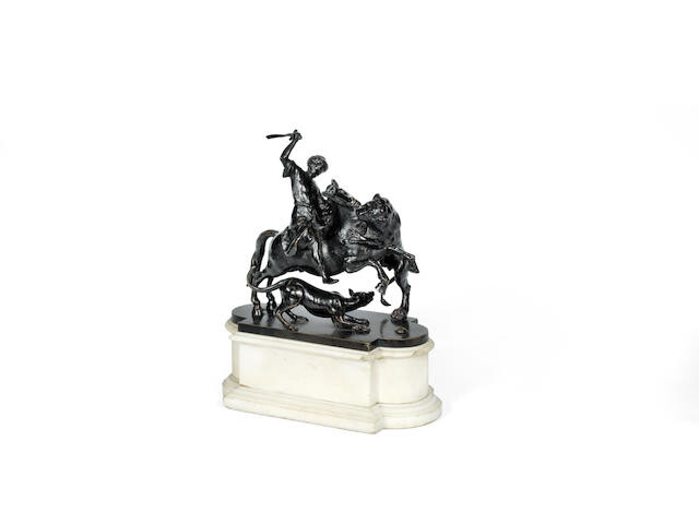 After Francesco Fanelli (Italian, 1590–1653): A 19th century patinated bronze equestrian group of a Turk and lion