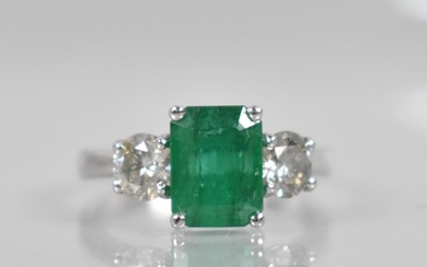 An 18ct White Gold, Diamond and Emerald Three Stone Ring, Ce...