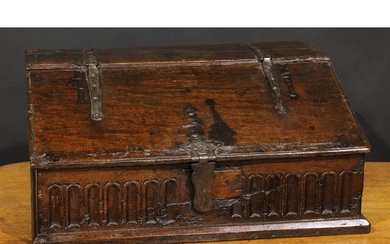 An 18th century oak boarded table box, hinged sloping top ab...