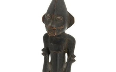 An African carved Senufo figure