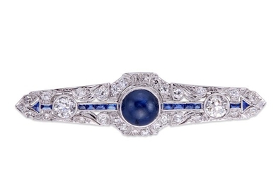 An Art Deco platinum, sapphire, and diamond brooch centering...