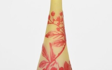 An Art Nouveau Galle cameo glass solifleur vase designed by Emile Galle, tapering cylindrical yellow glass body with everted rim, overlaid with coral red glass, cameo decorated with berried foliage, cameo Galle signature to side, 13.5cm. high