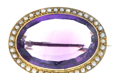 An early 20th century gold amethyst and split pearl brooch.