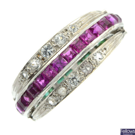 An early 20th century gold synthetic ruby, green and colourless paste hinged ring.