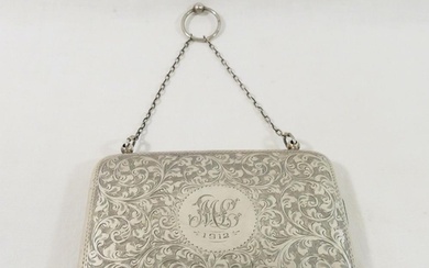 An early 20th century ladies rectangular hinged silver purs...