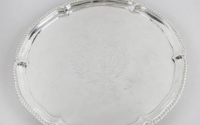 An early George III silver salver, the circular form