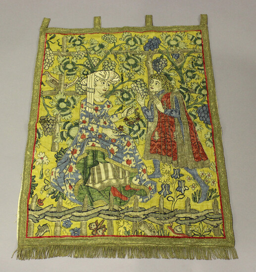 An early/mid-20th century stained cotton and gilt thread wall hanging depicting Tristan and Isolde w