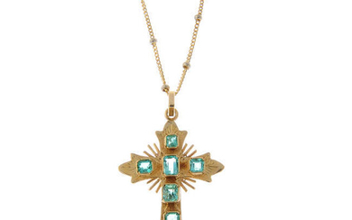 An emerald cross pendant, with bi-colour bead accent chain.