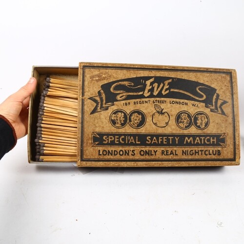 An oversized Eve shop advertising matchbox case, filled with...