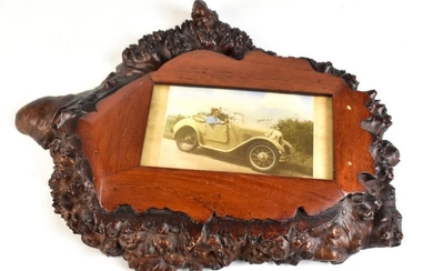 An unusual burl wood block fashioned as a photograph...