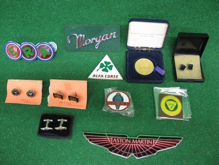 Assorted motoring collectables to include: Aston Martin and ERA boot badges, Austin, Rolls Royce and Mercedes cufflinks,...