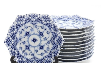 “Blue Fluted Full Lace”. A set of 12 Royal Copenhagen porcelain pastry plates with double lace border. Diam. 17 cm. (12)