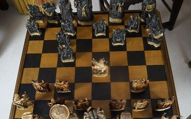 CHESS TABLE AND 30 ANIMALIA AND FIGURAL PIECES
