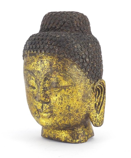 Carved stone gilded Buddha head, 19cm high